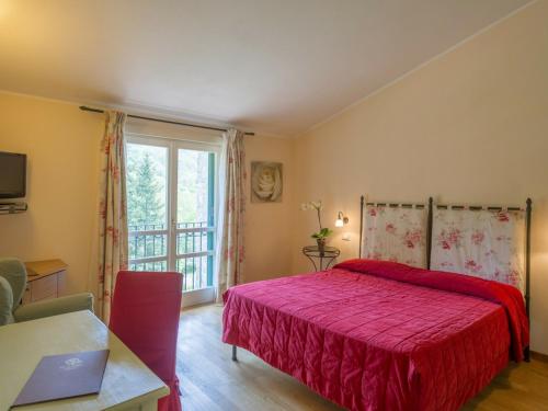 Cà Del Moro Resort tesisinde bir odada yatak veya yataklar