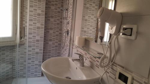 Koupelna v ubytování Hotel Milano