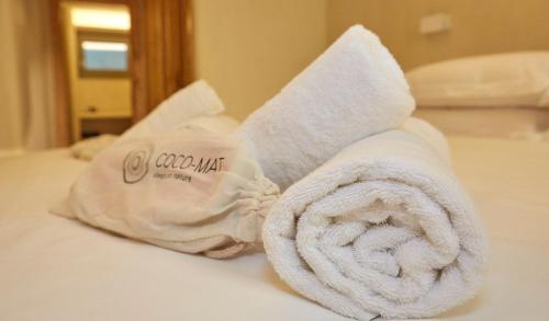 Una cama o camas en una habitación de Sunrise Tsagkarada
