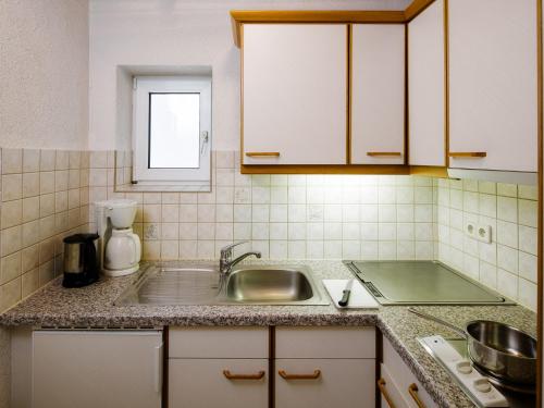 Kuchyňa alebo kuchynka v ubytovaní Apart Römerhof