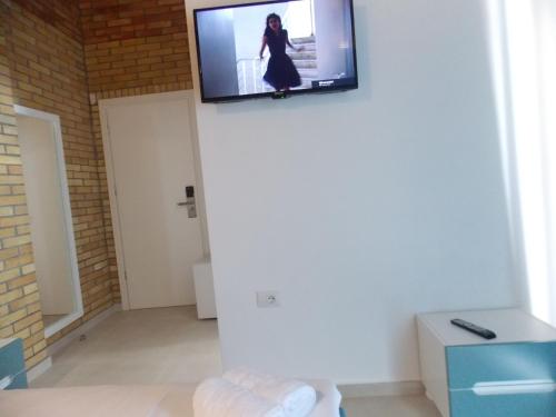 Televisyen dan/atau pusat hiburan di Hotel Piccolino