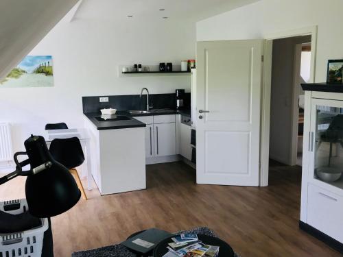 Dapur atau dapur kecil di Appartements unter Reet