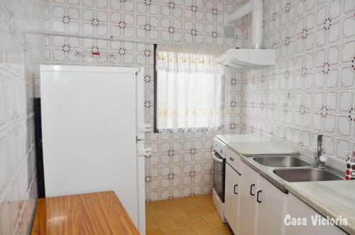 a kitchen with a sink and a counter top at Casa Victoria 2 in La Vilella Baixa