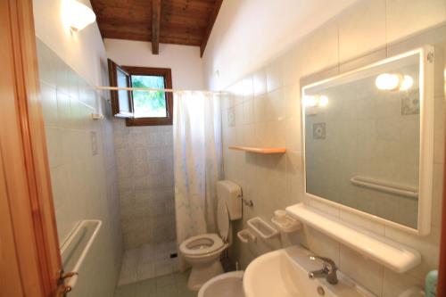 Ett badrum på Residence Il Giunco