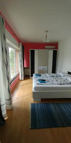 Ένα ή περισσότερα κρεβάτια σε δωμάτιο στο Guesthouse Una 1 Bihac