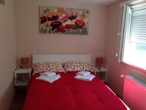 Llit o llits en una habitació de Apartment Kamencic