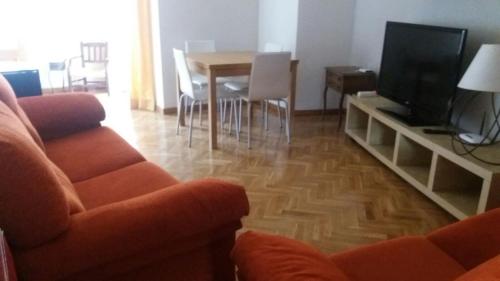 Кът за сядане в Apartamento Turístico Sigüenza