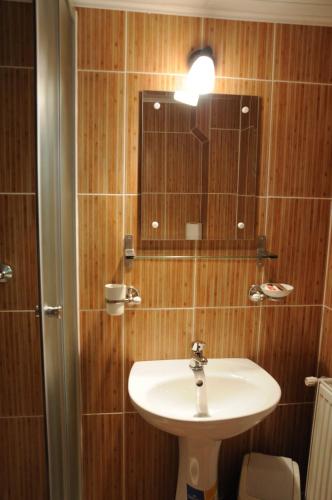 Et badeværelse på Căsuța de lângă pădure