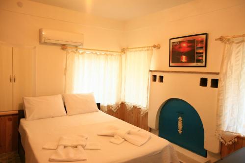 Cama o camas de una habitación en Halise Apart