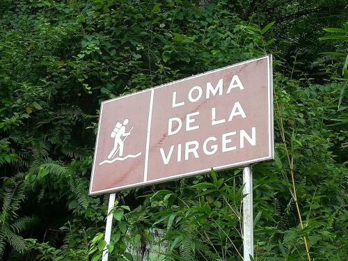 a sign that reads luna de la virgen at Posada El Acuario in Bahía Solano