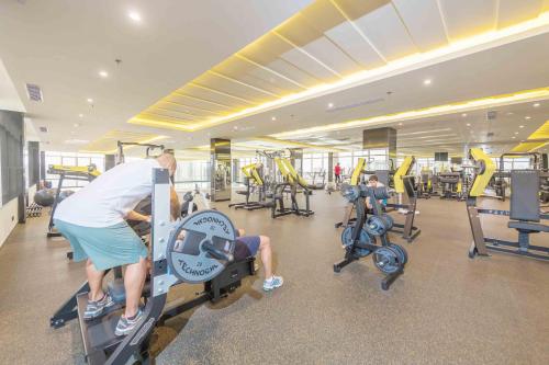 a group of people working out in a gym at Bayat Hotel in Khamis Mushayt