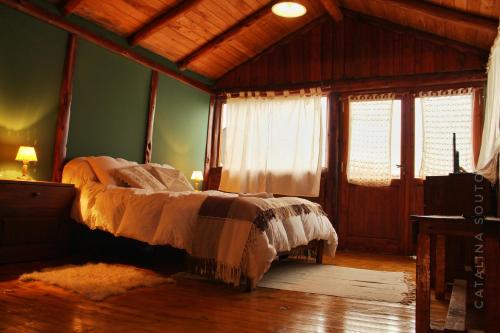Ένα ή περισσότερα κρεβάτια σε δωμάτιο στο Criollo Lodge
