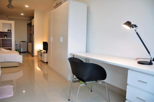 Ein Bett oder Betten in einem Zimmer der Unterkunft Shaftsbury Cyberjaya by IdealHub