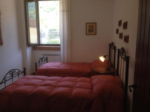 Кровать или кровати в номере Villa Oceri