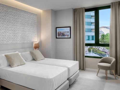 Posteľ alebo postele v izbe v ubytovaní Opera House Valencia B&B