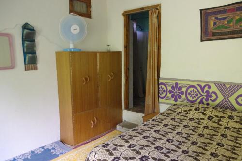 Postel nebo postele na pokoji v ubytování Orchard Huts
