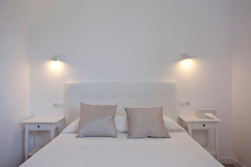 Una cama o camas en una habitación de Can Moragues de Soller