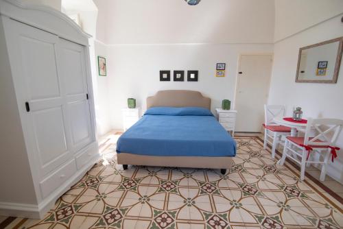 Voodi või voodid majutusasutuse Villa Enea Monopoli toas