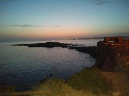 a view of a body of water at sunset at Calatabarca B&B in Tabarca