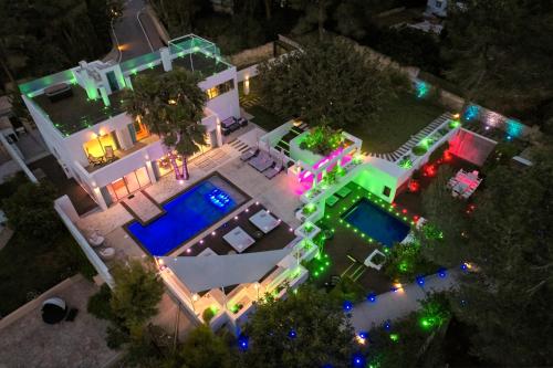 an overhead view of a house with lights at Casa India Ibiza in Santa Eularia des Riu