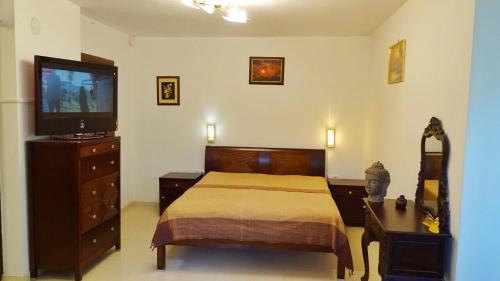 Кровать или кровати в номере Apartment Kafedral