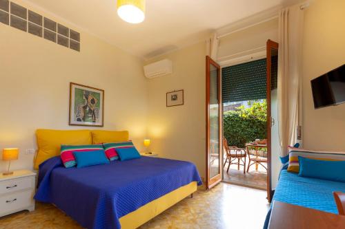 Säng eller sängar i ett rum på Villa Rosa Sorrento