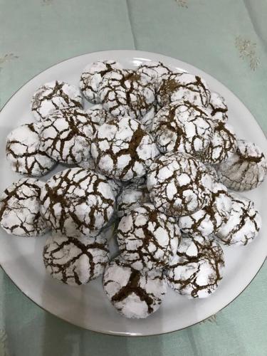 a pile of cookies on a plate on a table at Agriturismo Miracco Atanasio Franco "Il Maniero" in Santa Sofia dʼEpiro