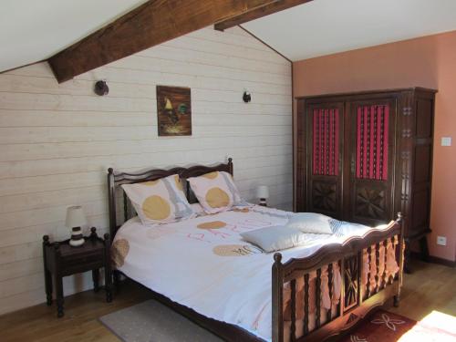 Ένα ή περισσότερα κρεβάτια σε δωμάτιο στο Le Piquet