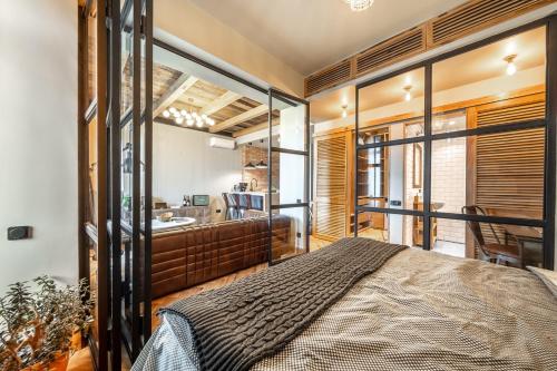 Ένα ή περισσότερα κρεβάτια σε δωμάτιο στο Design Apartment