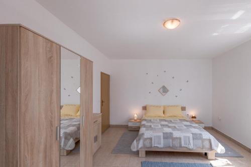Ліжко або ліжка в номері Apartment stari kesten