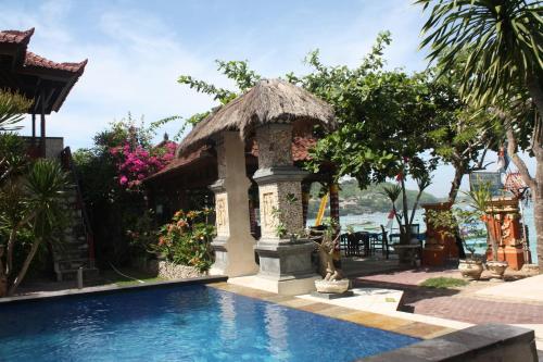 Kolam renang di atau dekat dengan Bungalow No 7