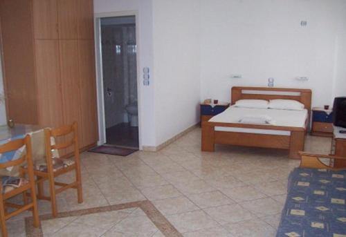 Postel nebo postele na pokoji v ubytování Georgia Studios