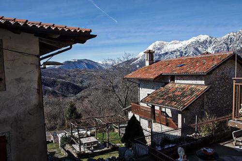 a house with a view of a mountain at A casa mia in Meduno