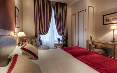 Ένα ή περισσότερα κρεβάτια σε δωμάτιο στο Best Western Premier Trocadero La Tour