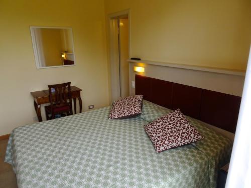 Katil atau katil-katil dalam bilik di Hotel Versilia
