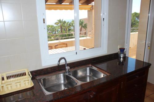 A kitchen or kitchenette at Chalets Torre Nova