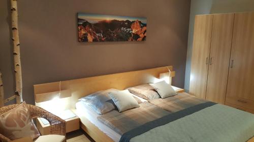 Ένα ή περισσότερα κρεβάτια σε δωμάτιο στο APARTMENT PRIVAT LUNA - Vysoké Tatry