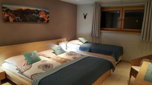 Ένα ή περισσότερα κρεβάτια σε δωμάτιο στο APARTMENT PRIVAT LUNA - Vysoké Tatry