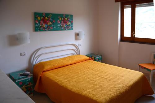 Cama o camas de una habitación en B&B Villa Garden