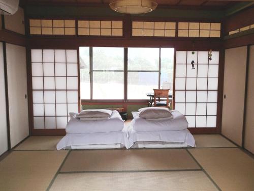 A seating area at Setouchi Guest House Taiyo and Umi