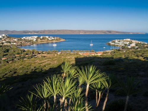 a view of a bay with boats in the water at Sounio Villa in Sounio