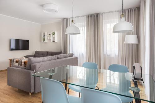 Posteľ alebo postele v izbe v ubytovaní Olymp 114 i 120 z basenem, sauną i jacuzzi w cenie