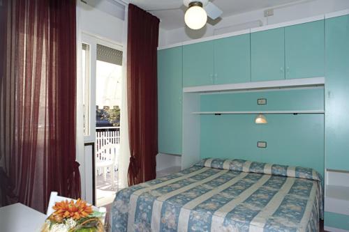 Postel nebo postele na pokoji v ubytování Hotel Fortuna