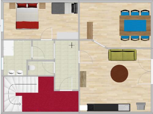 a floor plan of a room with red white and blue at Apartments Radstadt in Radstadt