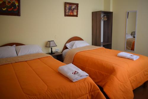 Krevet ili kreveti u jedinici u okviru objekta Peru Swiss Hostel