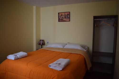 Katil atau katil-katil dalam bilik di Peru Swiss Hostel