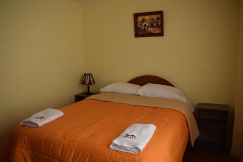 Katil atau katil-katil dalam bilik di Peru Swiss Hostel