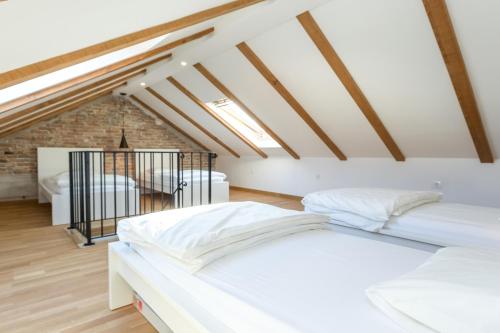 two beds in a room with a attic at House "Vesela" in Biograd na Moru