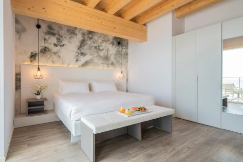 Postel nebo postele na pokoji v ubytování Hotel Elite