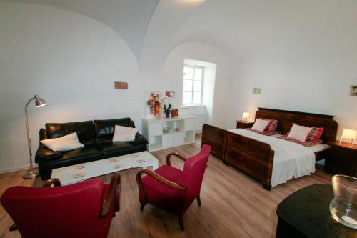 Postel nebo postele na pokoji v ubytování Galéria Apartman